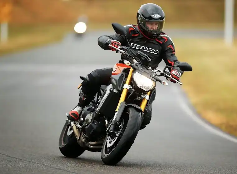 A rider with Techmoto Motorcycle Gear and Clothing
